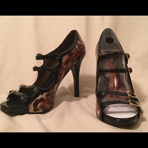 Carlos Santana black and leopard print heels